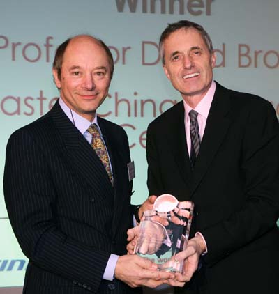 Professor David Brown (left) receiving his award from Mr Andrew Cahn, UKTI CEO