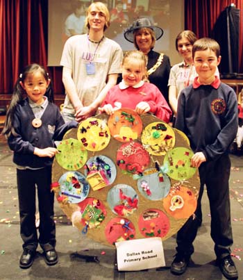 from back left: LUVU volunteer Ben Burley-Ward, Mayor Janie Kirkman, LUVU schools project co-ordinator Nichola Stewart with local schoolchildren