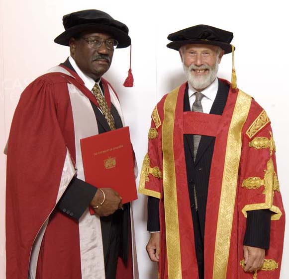 Clive Lloyd (left) receives honorary degree from Chancellor Sir Chris Bonnington