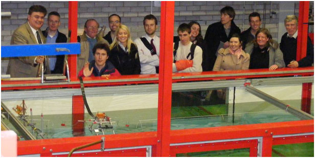 Dr G A Aggidis LUREG Director (left) with marine energy researchers at the LUREG Wave Tank Testing Facility