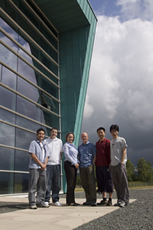 Students, Larry Chung, Andy Rosbrook, InfoLab21 Business Development Manager Justine Parkinson, Managing Director of Ultima Thule Carl Spencer and students, Tony Tong and Zhifeng Fan