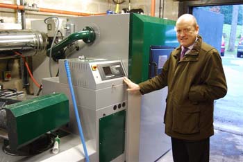 Nick Lancaster with the new biomass burner