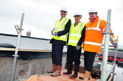 Professor Trevor McMillan( Pro-VC for Research ) and Professor Sue Cox (Dean of LUMS) with Director of Facilities Mark Swindlehurst