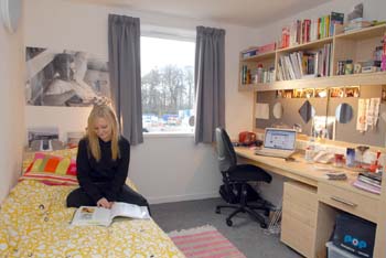 Student Emily Leonard who's studying Fine Art in her room
