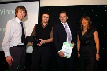 Margaret Hilton of Johnston Press presented the award to Darren Axe, Mark Taylor and Jonathan Mills of Lancaster University