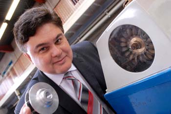 Director of Lancaster University Renewable Energy Group George Aggidis with model turbines.