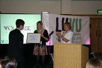 the mayor of Lancaster Janie Kirkman presenting the prize for most profitable social enterprise award to Queen Elizabeth School.